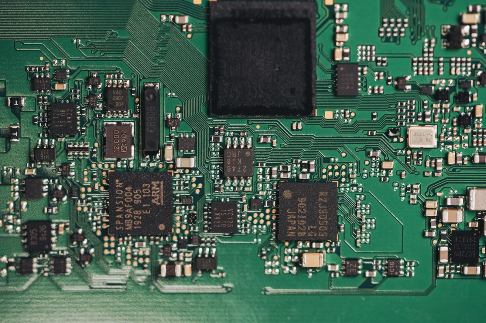 Detailed interconnected electronic components on a circuit board