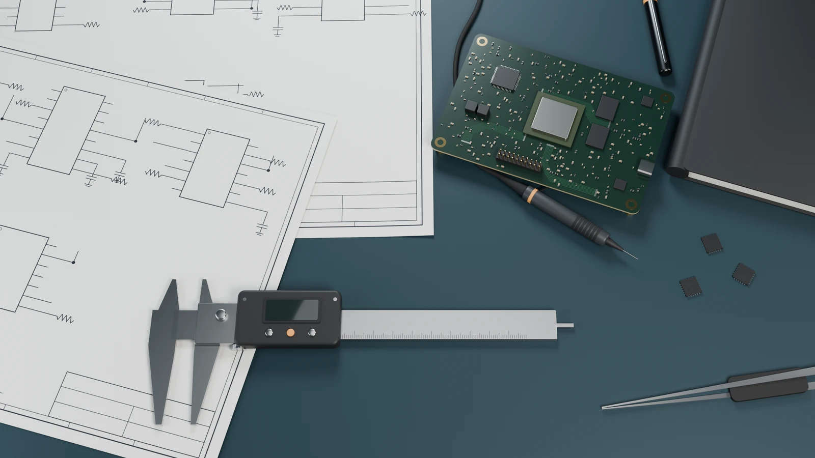 Engineering desk with schematics, a circuit board, calipers and a scope probe